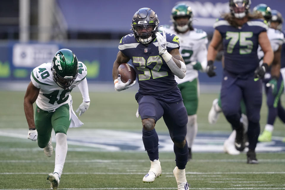 Seattle Seahawks running back Chris Carson carries against the New York Jets during the second half of an NFL football game, Sunday, Dec. 13, 2020, in Seattle. (AP Photo/Ted S. Warren)