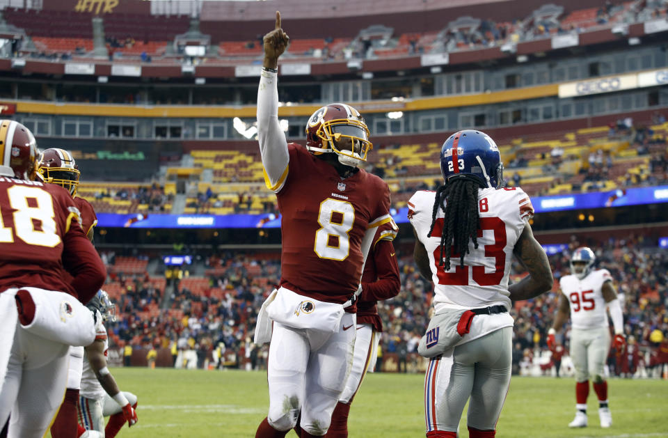 Washington quarterback Josh Johnson wanted to learn his new teammates, so he clicked on the video game console. (AP)