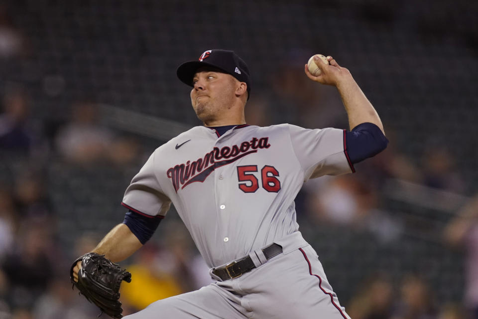 Minnesota Twins relief pitcher Caleb Thielbar throws during the seventh inning of the second baseball game of a doubleheader against the Detroit Tigers, Tuesday, May 31, 2022, in Detroit. (AP Photo/Carlos Osorio)