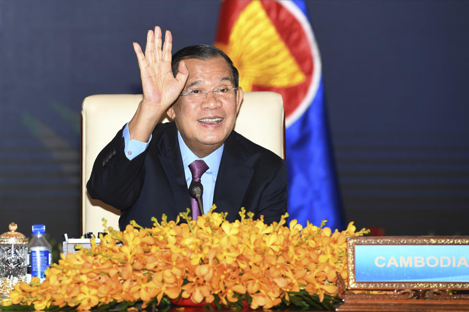 FILE - In this photo provided by the An Khoun Sam Aun/National Television of Cambodia, Cambodian Prime Minister Hun Sen gestures as he joins an online meeting of the ASEAN-China special summit at Peace Palace in Phnom Penh, Cambodia, Monday, Nov. 22, 2021. The U.S. has ordered an arms embargo on Cambodia, citing deepening Chinese military influence, corruption and human rights abuses by the government and armed forces in the Southeast Asian country. (An Khoun SamAun/National Television of Cambodia via AP, File)