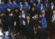 Tsai Eng-meng, owner of CTi TV, shouts after the cable news channel halts its broadcast operations at the hall of CTi TV in Taipei, Taiwan, Friday, Dec. 11, 2020. CTi TV, a leading pro-China cable news channel, halted its broadcast operations at midnight Friday after Taiwan''s government refused to renew its license, citing accuracy issues. (AP Photo/Chiang Ying-ying)