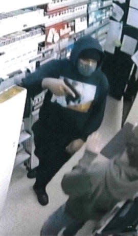 This surveillance camera image shows a suspect who Muncie Police say robbed the Village Pantry at 2501 S. Macedonia Ave., between 3 and 4 a.m. on April 4.