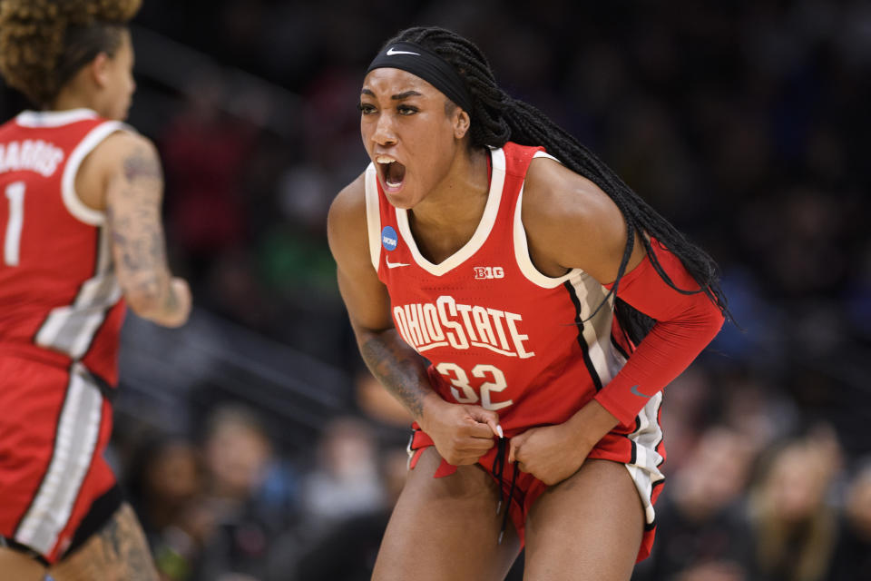 Ohio State forward Cotie McMahon (32) celebrates after scoring a basket as her team takes the lead over UConn in the second quarter of a Sweet 16 college basketball game of the NCAA Tournament in Seattle, Saturday, March 25, 2023. (AP Photo/Caean Couto)