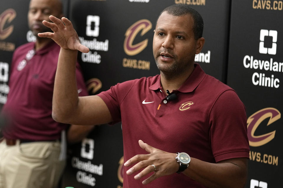 Koby Altman, president of basketball operations for the Cleveland Cavaliers, answers a question at a news conference in Brecksville, Ohio, Friday, May 24, 2024. (AP Photo/Sue Ogrocki)