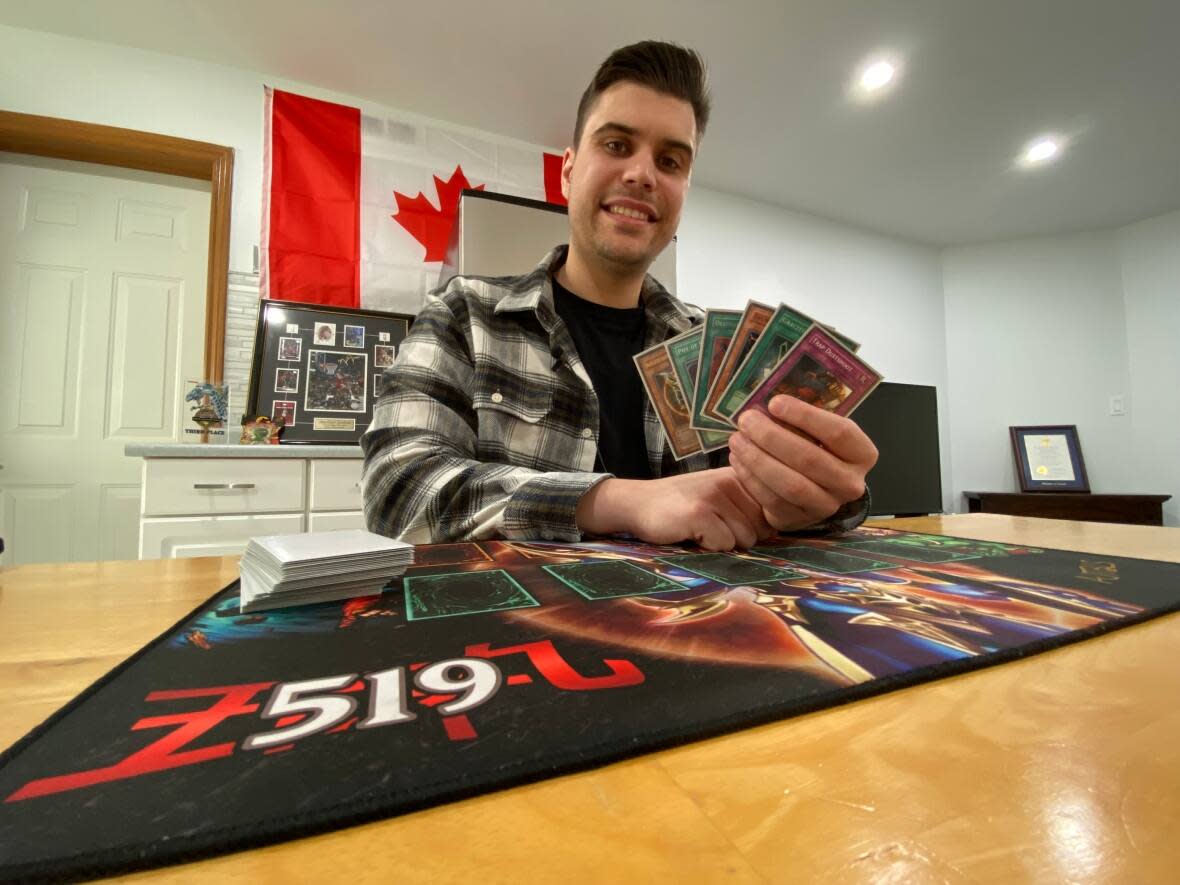 Adam Teshuba started playing Yu-Gi-Oh again as an adult five years ago and climbed to the top spot in the world for the GOAT format. (Jason Viau/CBC - image credit)