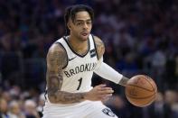 Apr 13, 2019; Philadelphia, PA, USA; Brooklyn Nets guard D'Angelo Russell (1) dribbles against the Philadelphia 76ers during the third quarter in game one of the first round of the 2019 NBA Playoffs at Wells Fargo Center. Mandatory Credit: Bill Streicher-USA TODAY Sports