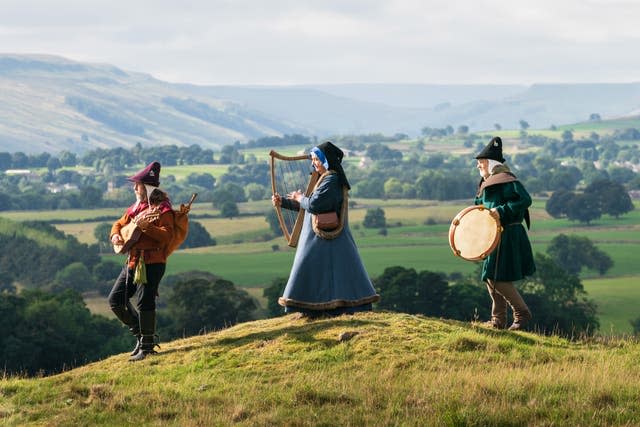 Members of medieval group Maranella in the grounds of Castle Bolton