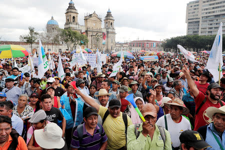 People take part in a march to demand the resignation of Guatemala's President Jimmy Morales in Guatemala City, Guatemala September 12, 2018. REUTERS/Luis Echeverria