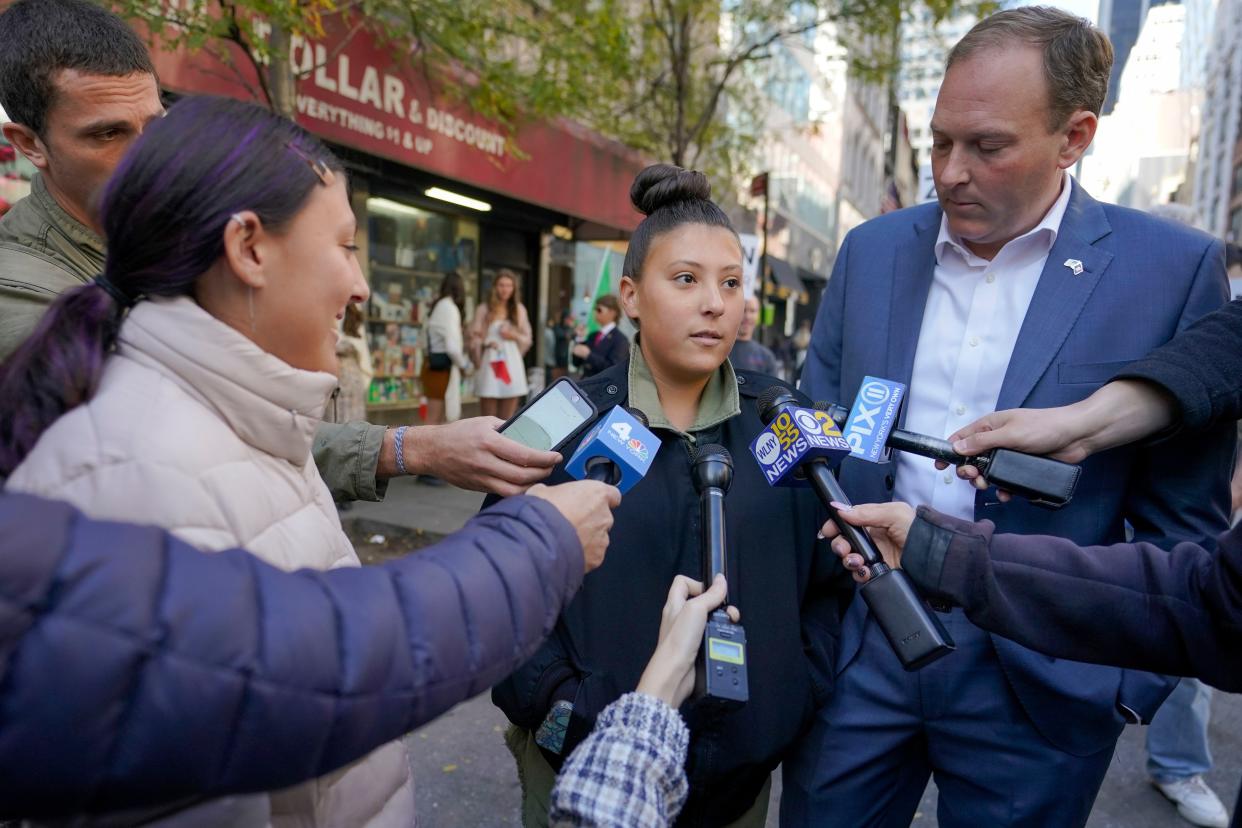 Republican candidate for New York Governor Congressman Lee Zeldin, right, stands with his daughters Arianna, center, and Mikayla as they speak to reporters before marching in the 78th Annual Columbus Day Parade, Monday, Oct. 10, 2022, in New York. 