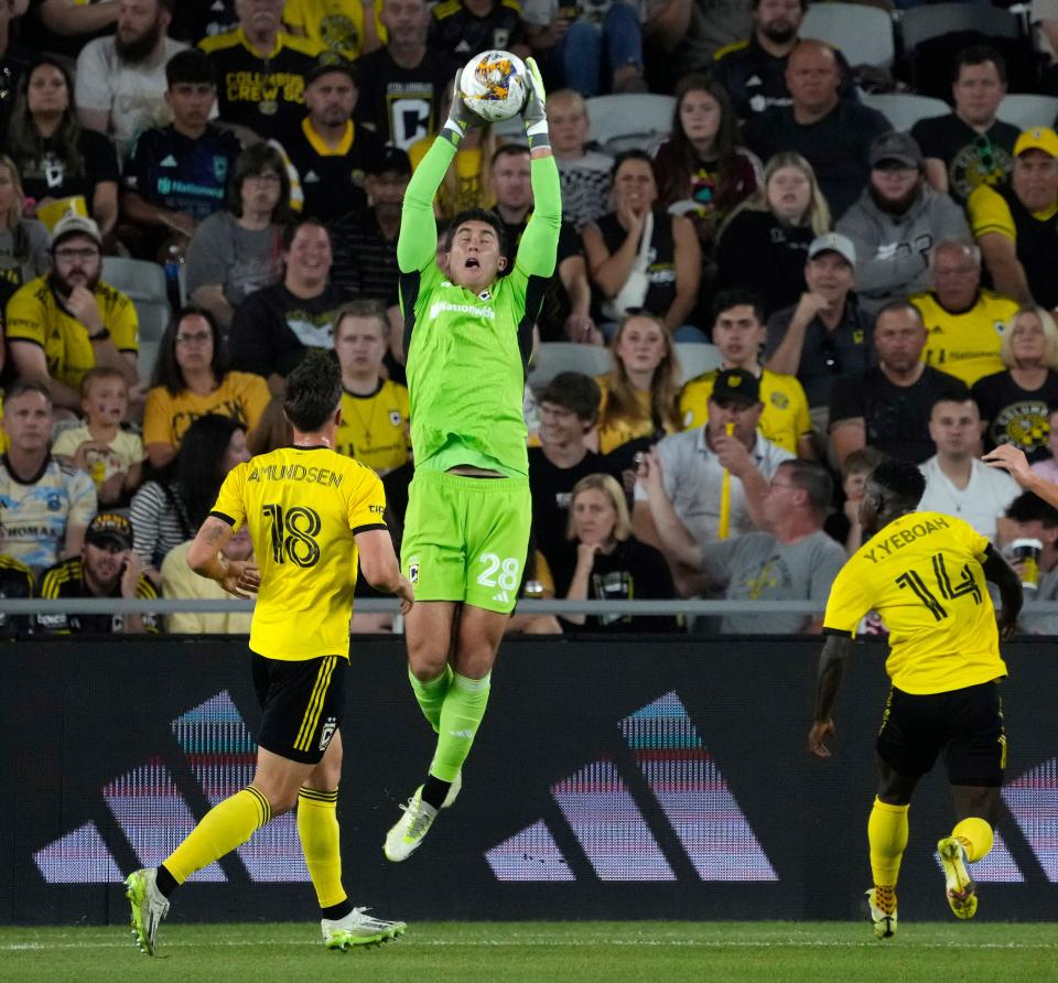 Sept. 30, 2023; Columbus, Oh., USA; 
Columbus Crew goalkeeper Patrick Schulte (28) makes a save during the first half of Saturday's soccer match against the Philadelphia Union at Lower.com Field in Columbus.