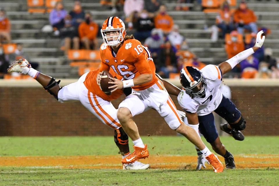 Clemson Tigers quarterback Trevor Lawrence (16) scrambles during a game against the Virginia Cavaliers on Oct. 03, 2020. (Dannie Walls/Icon Sportswire via Getty Images)