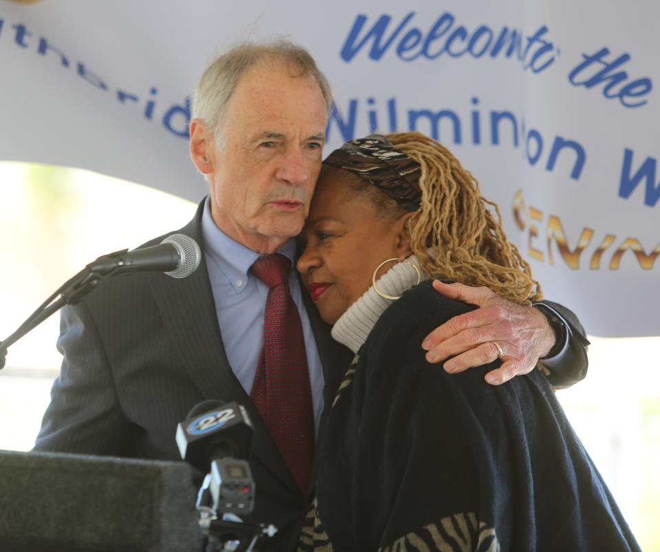 Sen. Tom Carper and Hanifa Shabazz embrace during a press conference on Wednesday, Oct. 19, 2022, marking the opening of the Southbridge Wilmington Wetlands Park.