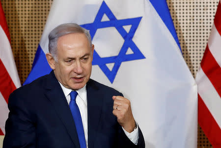 FILE PHOTO: Israeli Prime Minister Benjamin Netanyahu speaks as he meets with U.S. Vice President Mike Pence in Warsaw, Poland, February 14, 2019. REUTERS/Kacper Pempel -/File Photo