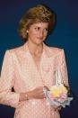 <p>A return to Diana's forever favorite pattern: polka dots. She wore this peach polka dot blazer in July 1989.<br></p>