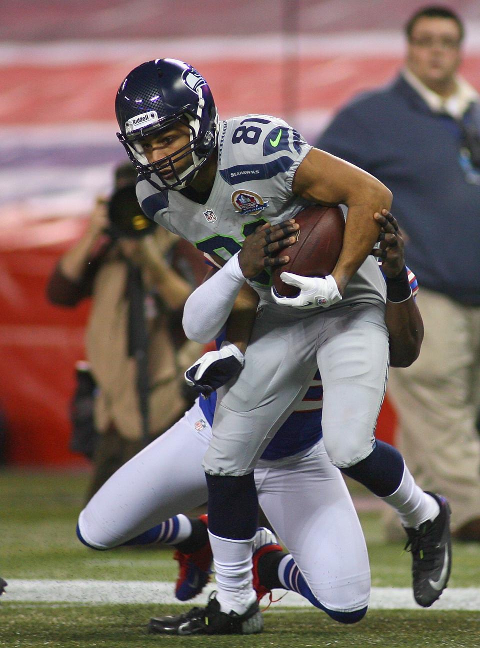 TORONTO, ON - DECEMBER 16: Golden Tate #81 of the Seattle Seahawks runs after a catch against the Buffalo Bills at Rogers Centre on December 16, 2012 in Toronto, Ontario.Seattle won 50-17. (Photo by Rick Stewart/Getty Images)