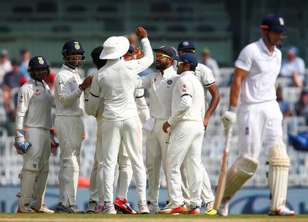 Cricket - India v England - Fifth Test cricket match - M A Chidambaram Stadium, Chennai, India - 16/12/16. India's players celebrate the wicket of England's Alastair Cook. REUTERS/Danish Siddiqui