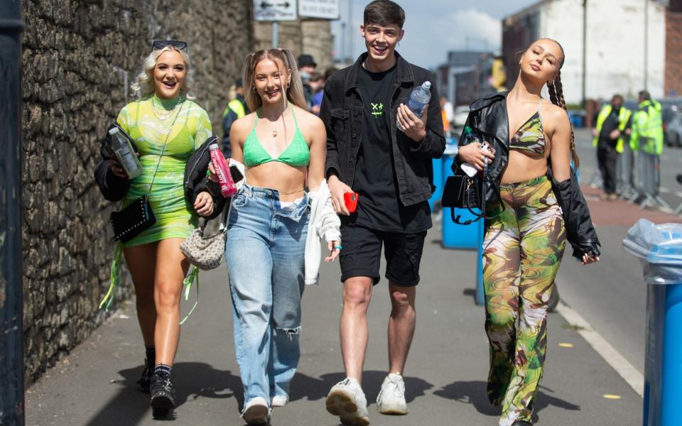 Revellers arrive at Bramley-Moore Dock in Liverpool - Mercury Press