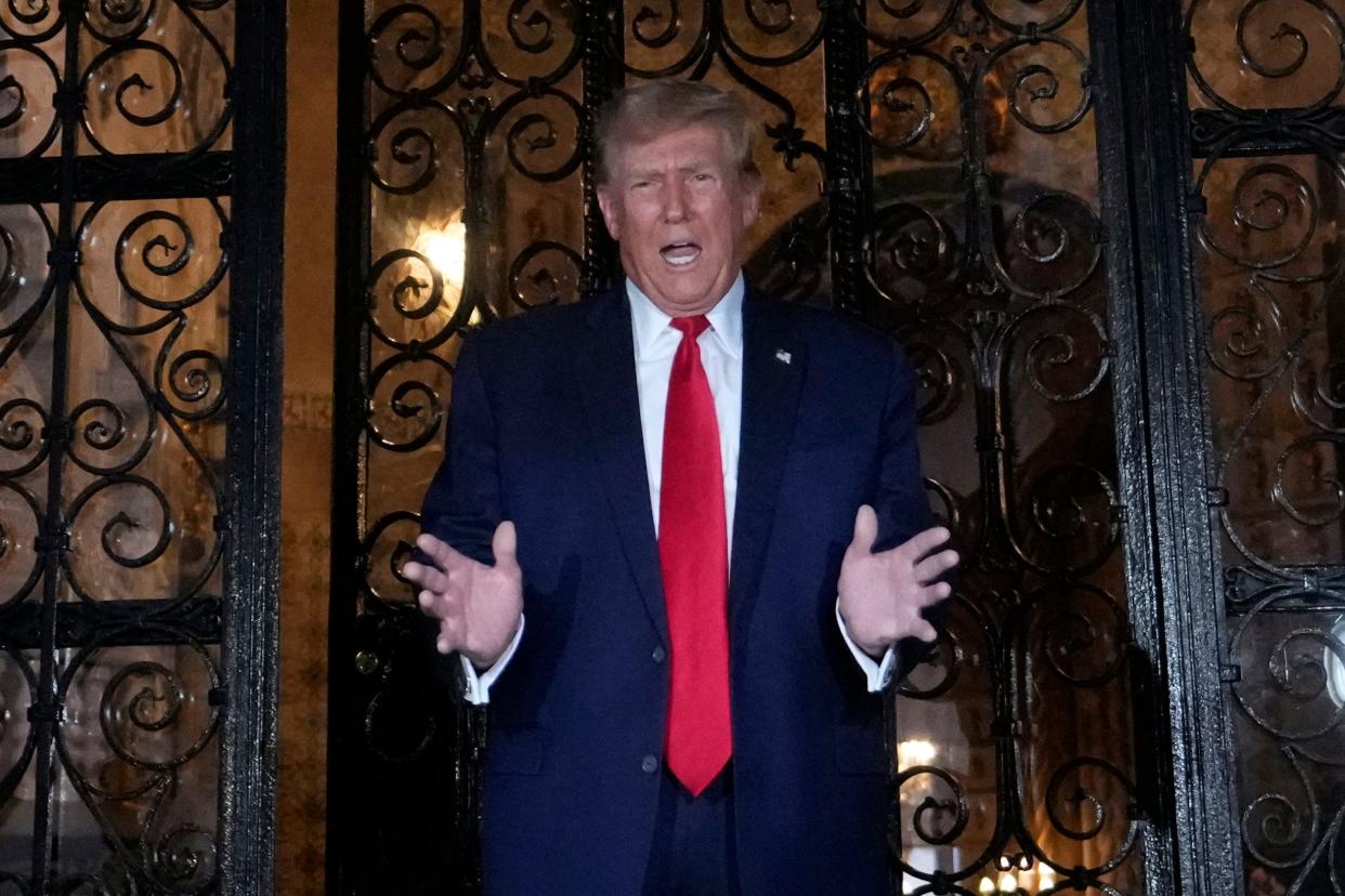 Republican presidential candidate former President Donald Trump speaks at his Mar-a-Lago estate on Friday, Feb. 16, after New York Judge Arthur Engoron hit him with $453.5 million in penalties and interest over years of real estate fraud.