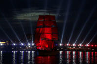 Sweden's brig Tre Kronor with scarlet sails floats on the Neva River during the Scarlet Sails festivities marking school graduation, in St. Petersburg, Russia, June 24, 2018. REUTERS/Henry Romero