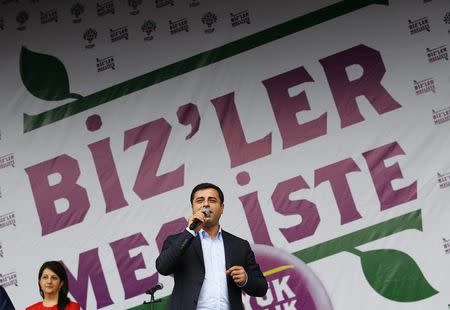 Selahattin Demirtas, co-chairman of the Pro-Kurdish Peoples' Democratic Party (HDP), addresses his supporters during a gathering to celebrate the party's victory during the parliamentary election, in Istanbul, Turkey, June 8, 2015. REUTERS/Murad Sezer