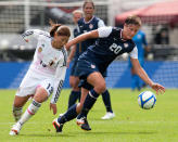 HALMSTAD, SWEDEN - JUNE 18: Abby Wambach USA (R) vies against Rumi Utsugi of Japan during the Swedish Invitational Women's Volvo Cup match between Japan and USA on June 18, 2012 in Halmstad, Sweden. (Photo by Berndt Wennebrink/Getty Images)