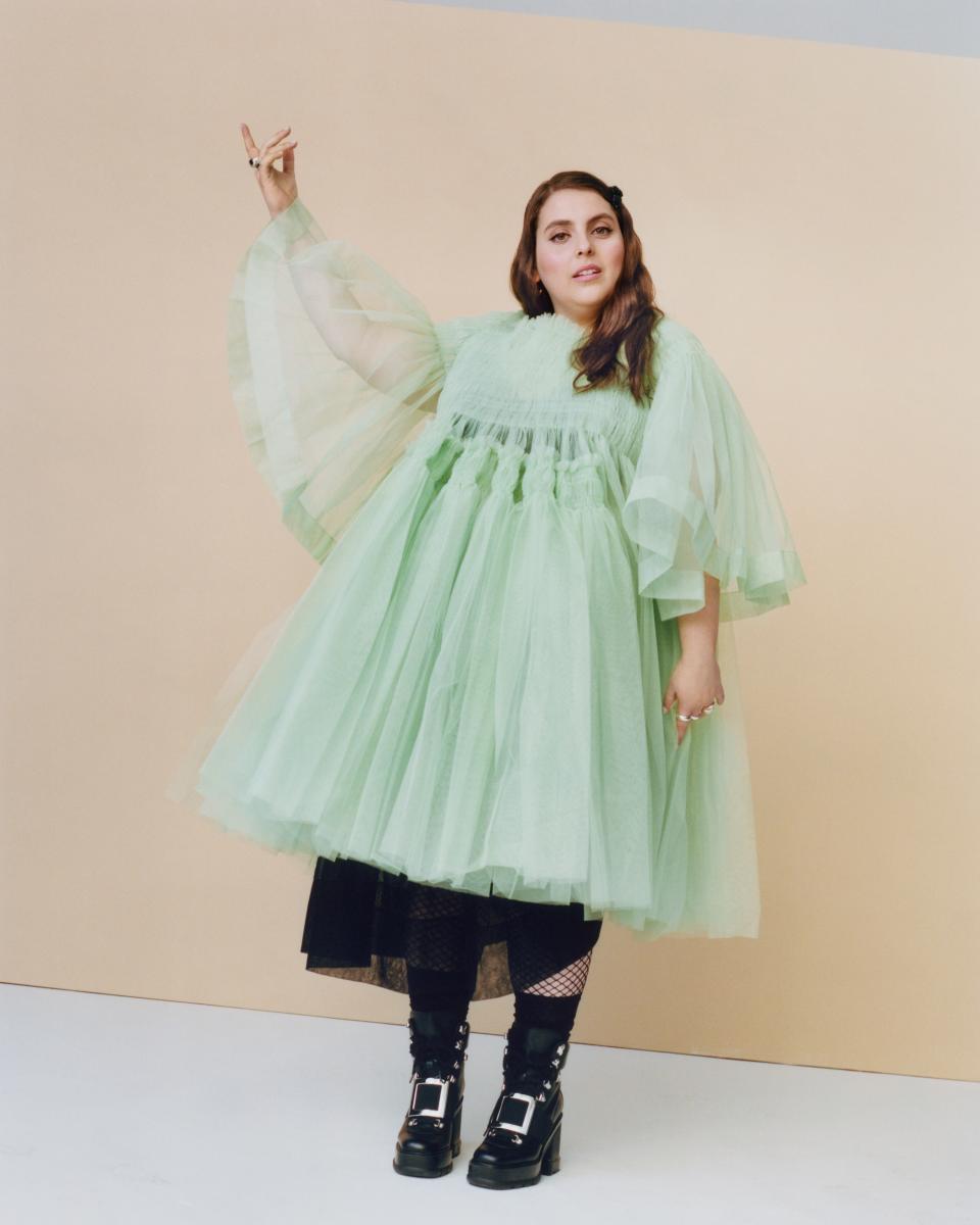 Molly Goddard dress, Price Upon Request. Simone Rocha skirt and barrette, Price Upon Request. Roger Vivier boots, $1,550. Pamela Love rings, $170-$190 (worn throughout). Jennifer Fisher ring (worn throughout), $295. Wolf Circus rings (worn throughout), $150-$160. Saskia Diez earcuffs (worn throughout), $86-$104. Jennifer Fisher earrings; $295.