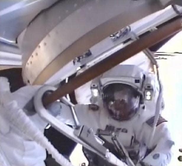 In this frame grab taken from NASA television, U.S. astronaut Stephen Bowen works on the International Space Station during a spacewalk.