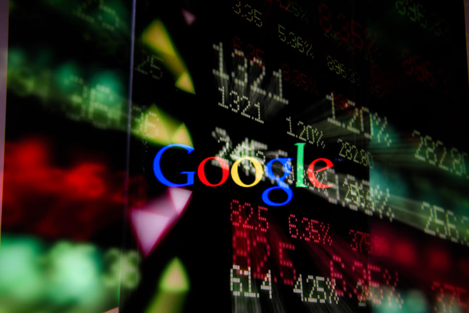 POLAND - 2020/07/16: In this photo illustration a multiple exposure image shows a Google logo displayed on a smartphone with stock market percentages on the background. (Photo Illustration by Omar Marques/SOPA Images/LightRocket via Getty Images)