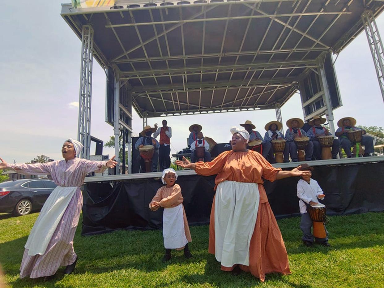 Members of Tryon Palace's Jonkonnu Troupe perform during last year's first Juneteenth celebration held in New Bern.