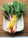 <p>With its red, purple, pink, yellow, and white stems, rainbow chard is as colorful as it is nutritious. Rich in vitamins K, C, and A, it has only 35 calories per cup and lots of health-promoting <a href="http://www.ncbi.nlm.nih.gov/pubmed/12134711" rel="nofollow noopener" target="_blank" data-ylk="slk:carotenoids;elm:context_link;itc:0;sec:content-canvas" class="link ">carotenoids</a>. Sauté the veggie in clarified or grass-fed butter along with a few chili flakes or cayenne pepper, which also help <a href="https://www.redbookmag.com/body/healthy-eating/advice/g726/metabolism-boosting-foods/" rel="nofollow noopener" target="_blank" data-ylk="slk:boost your metabolism;elm:context_link;itc:0;sec:content-canvas" class="link ">boost your metabolism</a>. </p>