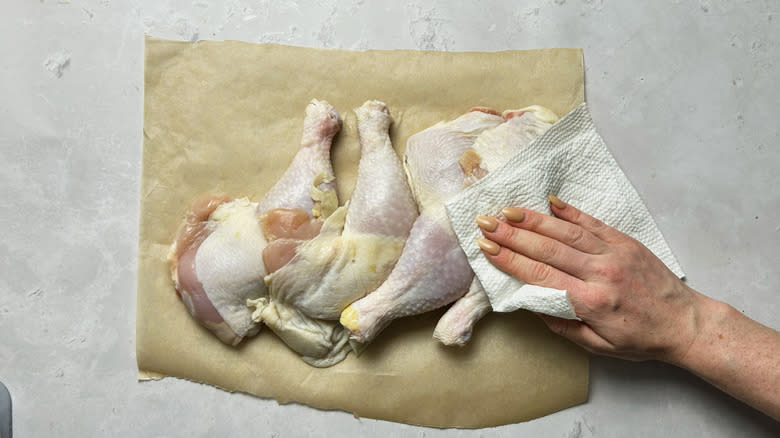 drying chicken with paper towel