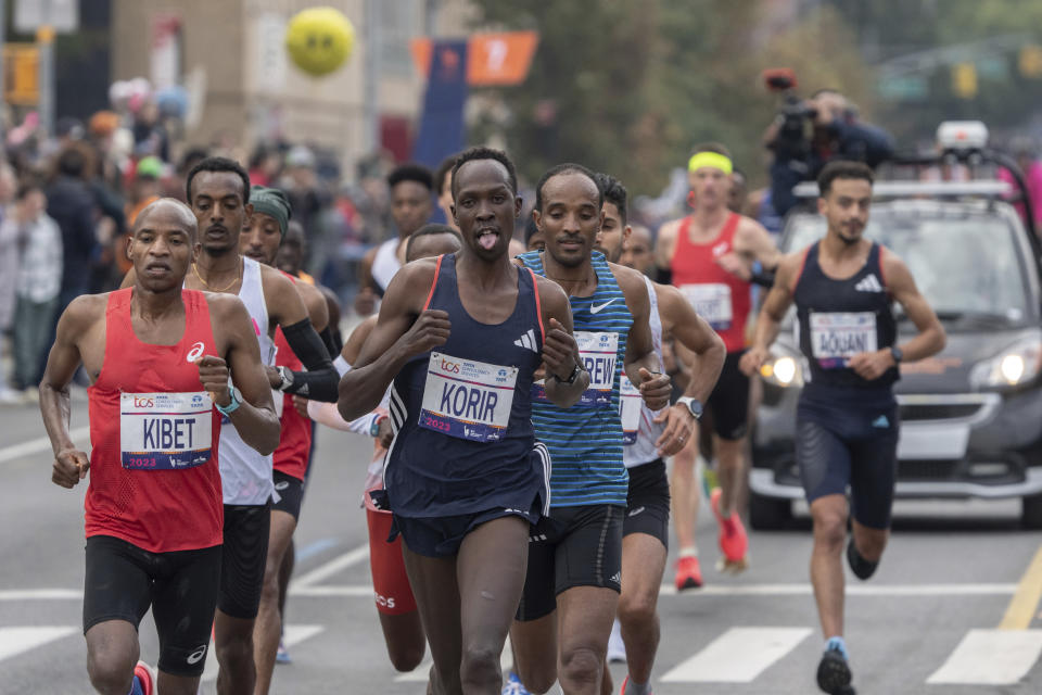 The men's elite runners compete during the New York City Marathon in New York, Sunday, Nov. 5, 2023. (AP Photo/Jeenah Moon)