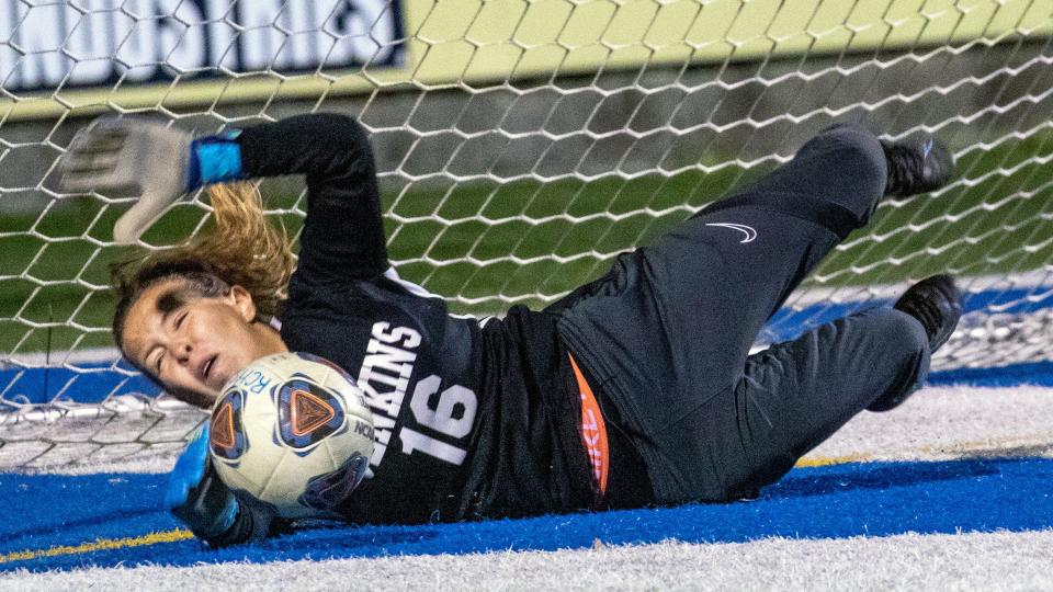 George Jenkins goalkeeper Ashlyn Maslyn makes a diving save during the penalty kick shootout that helped the Eagles go on to upset previously undefeated Ridge Community on Friday night in the Champions bracket semifinals of the Polk County girls soccer tournament.