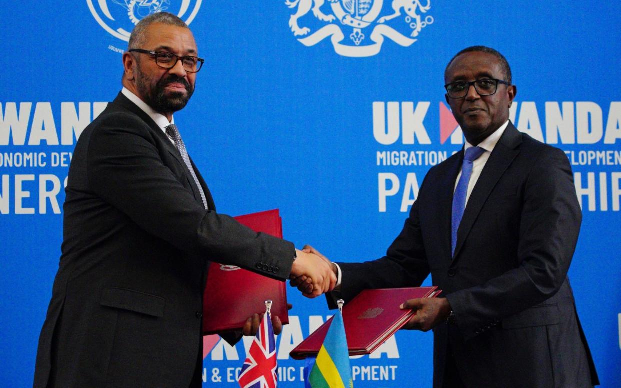 James Cleverly and Vincent Biruta after signing the new treaty in December 2023