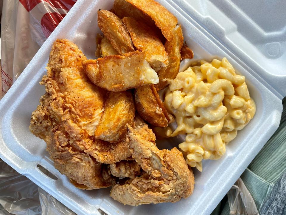 A hefty box of fried chicken, potato wedges and macaroni and cheese from Lawhon's Grocery & Meat in North Fort Myers.