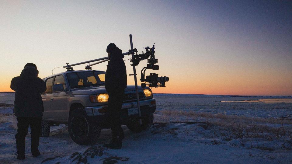 Filmmakers Gabriela Osio Vanden and Jack Weisman with their truck-mounted camera rig