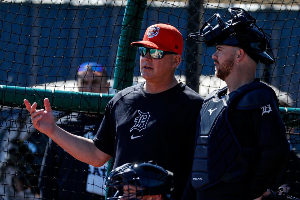 Detroit Tigers manager A.J. Hinch talks to catcher Jake Rogers during spring training at TigerTown in Lakeland, Fla. on Tuesday, Feb. 20, 2024.
