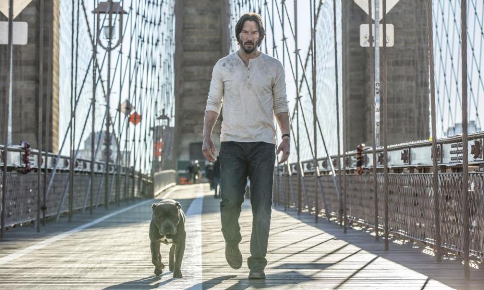 Excommunicado: Winston and John Wick (Keanu Reeves).