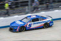 Kyle Larson (5) races in the NASCAR Cup Series auto race at Dover Motor Speedway, Sunday, May 1, 2022, in Dover, Del. (AP Photo/Jason Minto)