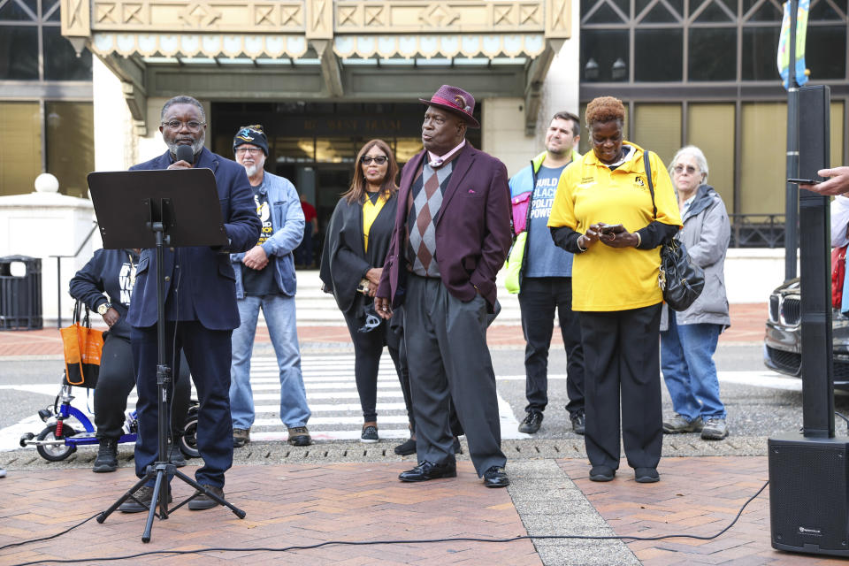 Ben Frazier, president of the Northside Coalition of Jacksonville, center, participates in a public rally by his coalition in front of city hall before a Jacksonville City Council meeting in Jacksonville, Fla., Jan. 18, 2023. A protracted legal fight over how city council districts were drawn in Jacksonville, Florida, reflects an aspect of redistricting that often remains in the shadows. Political map-drawing for congressional and state legislative seats captures wide attention after new census numbers are released every 10 years. No less fierce are the battles over the way voting lines are drawn in local governments, for city councils, county commissions and even school boards. (AP Photo/Gary McCullough)