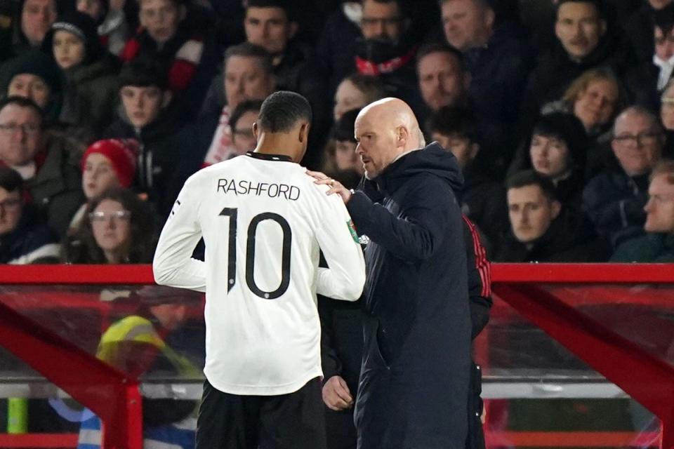 Manchester United manager Erik ten Hag embraces Marcus Rashford, left (Tim Goode/PA) (PA Wire)