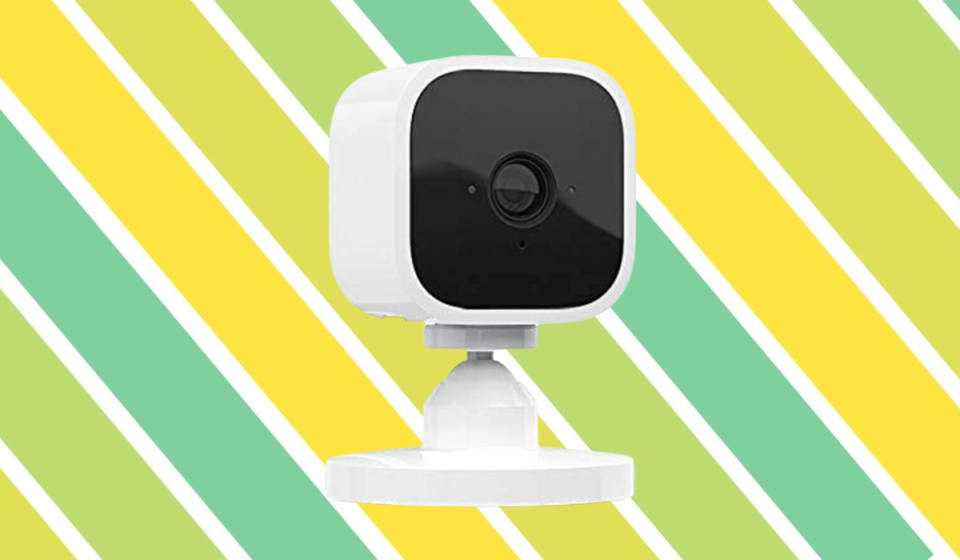 Blink Mini security camera on a striped background