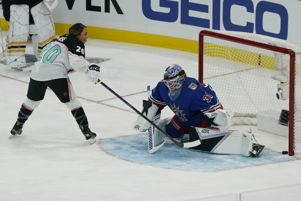 FILE - Canadian Olympic medalist Sarah Nurse scores a goal against New York Rangers goaltender Igor Shesterkin (31) during the NHL All Star Skills Showcase, Friday, Feb. 3, 2023, in Sunrise, Fla. The best women's hockey players in the world aren't the only ones in the sport excited about the new pro league launching in January. Many of the biggest stars across the NHL are eager to see the Professional Women's Hockey League and hope it thrives.(AP Photo/Marta Lavandier, File)