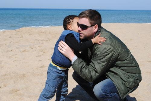 The writer with his son. Photo courtesy of Calvin Hennick.