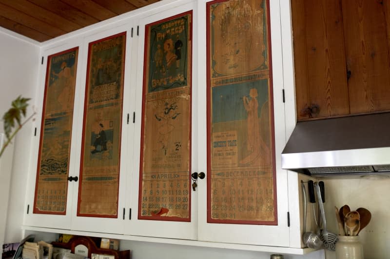 Calendars line the outside of Joan's cabinet doors.