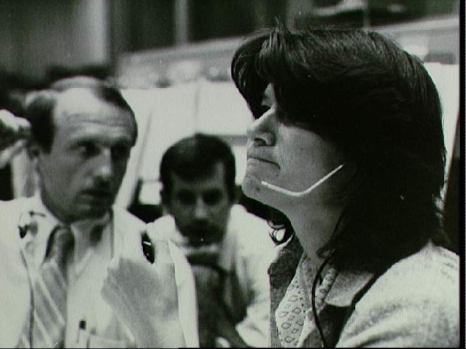 Astronaut Sally Ride at the CapCom console during STS-2 simulation. <cite>NASA</cite>