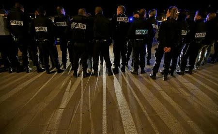 Police officers gather during an unauthorised protest against anti-police violence at the old harbour in Marseille, France, early October 19, 2016. REUTERS/Jean-Paul Pelissier