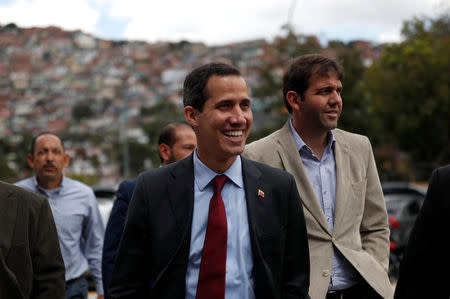 Venezuelan opposition leader Juan Guaido arrives to attend a meeting with representatives of FEDEAGRO, the Confederation of Associations of Agricultural Producers of Venezuela, in Caracas, Venezuela February 6, 2019. REUTERS/Carlos Garcia Rawlins