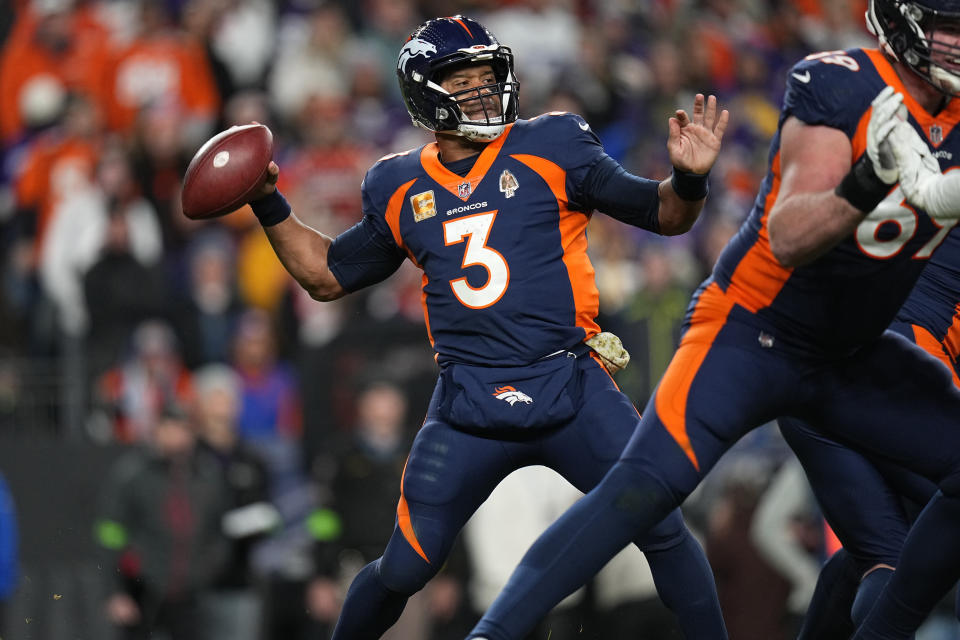 Denver Broncos quarterback Russell Wilson (3) throws against the Minnesota Vikings during the second half on an NFL football game, Sunday, Nov. 19, 2023, in Denver. (AP Photo/Jack Dempsey)