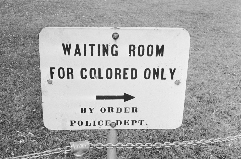 <span class="caption">Racism within U.S. institutions, businesses, and government is nothing new. This photo, taken in Jackson, Miss., is from 1961.</span> <span class="attribution"><a class="link " href="https://www.gettyimages.com/detail/news-photo/sign-in-jackson-mississippi-which-reads-waiting-room-for-news-photo/77558656?adppopup=true" rel="nofollow noopener" target="_blank" data-ylk="slk:Getty Images / William Lovelace;elm:context_link;itc:0;sec:content-canvas">Getty Images / William Lovelace</a></span>